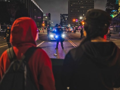 Tensions Rise as ICE Raid Protests Stretch Into the Night getty 1