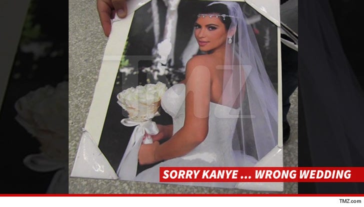 Kanye West -- I'm Not Signing that Pic That's Kim's :: 0125-kim-kanye-wedding-photos-autograph-tmz-9