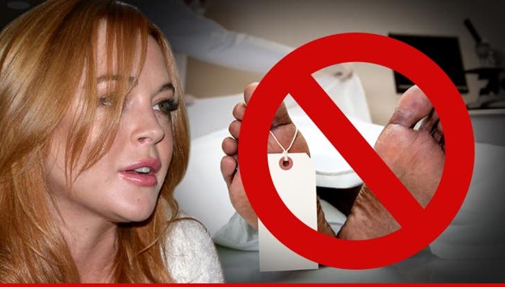 Lindsay Lohan -- Coroner Calls BS She Never Touched Whitney's :: 0915-lindsay-lohan-debunked-1