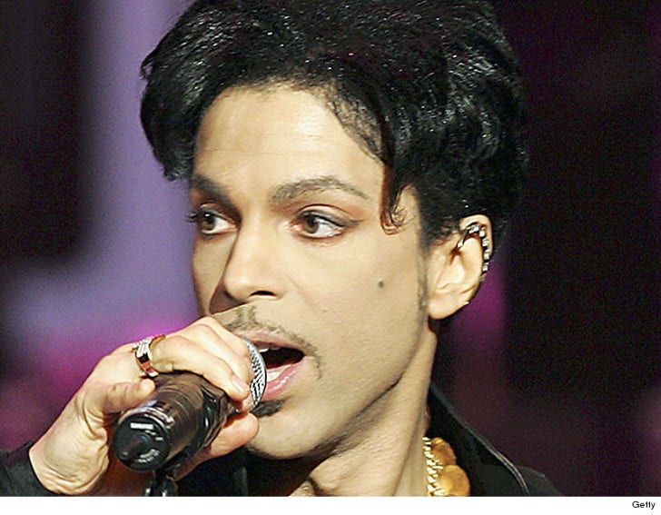 Prince -- Carried Off Jet by Bodyguard After Emergency Landing :: 0427-prince-getty-5