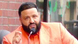 0411-dj khaled hwood star gall launch bg