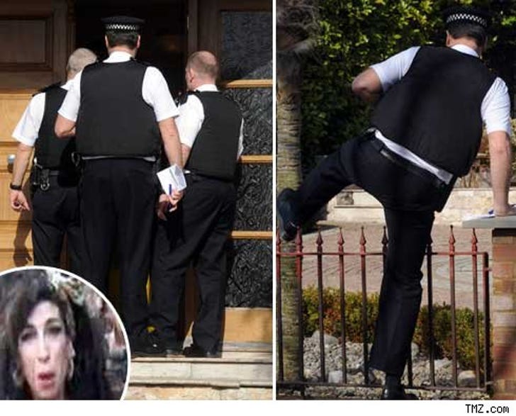Amy Winehouse Charged with Assault :: 0306_amy_winehouse_cops-1