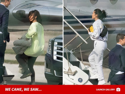 0412_kourtney-khloe-leaving-cleveland_splash-backgrid-03