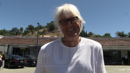 070225_john_tesh_kal